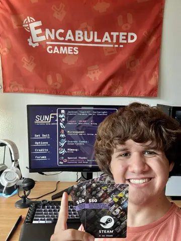 sup3r87 of Encabulated Games holding two Steam gift cards, with Sunfish on the monitor behind